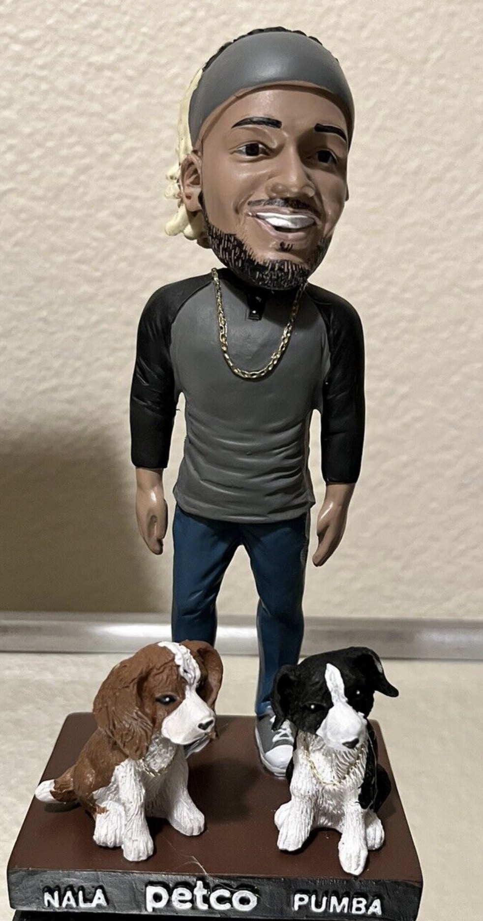 Fernando Tatis Jr., Nala, and Pumba bobblehead