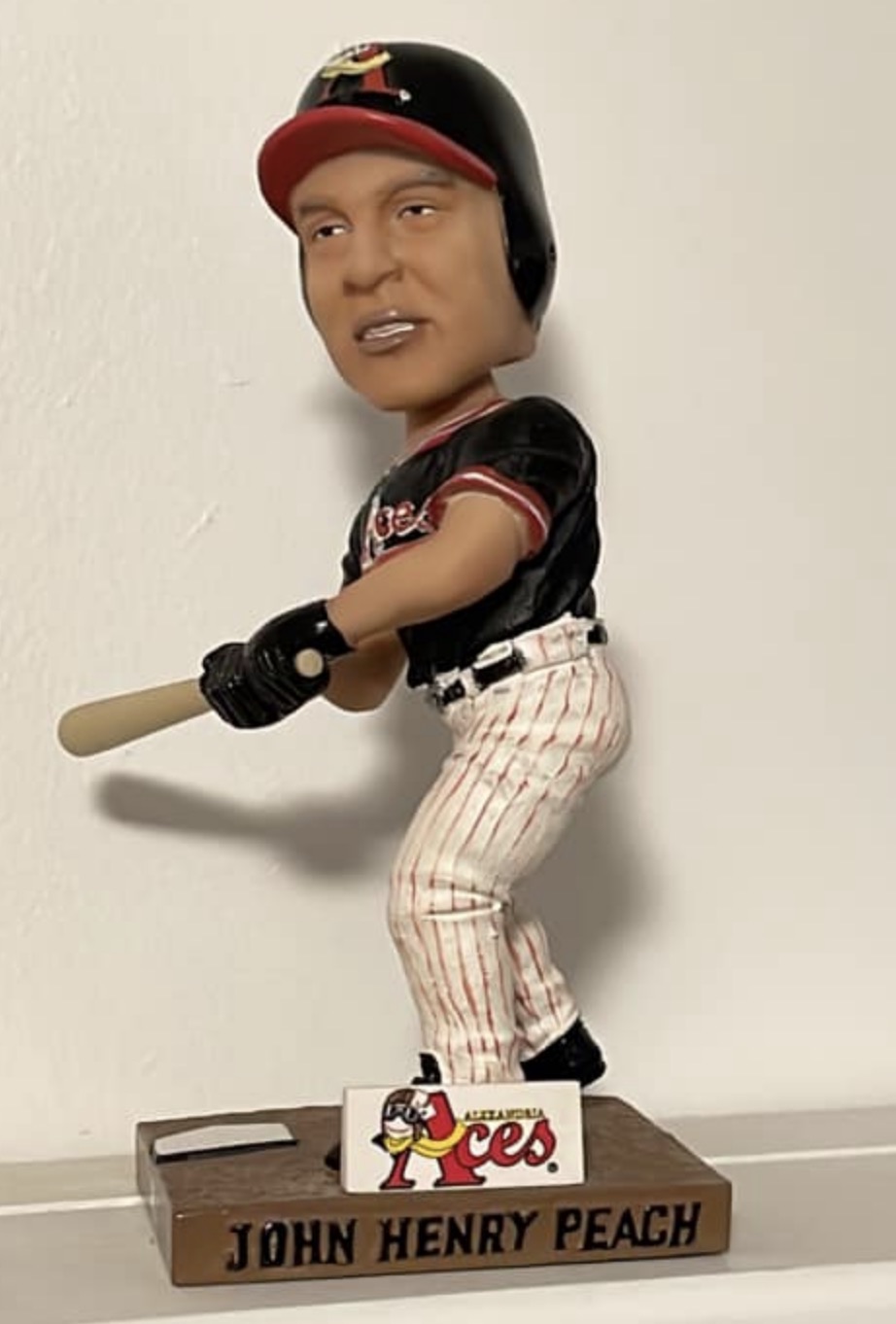 John Henry Peach bobblehead